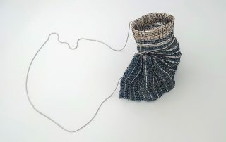 Smed: Pamela Wilson Foto: Filip Palmén. Titel: En behållare i Coronatider – a sign of our time